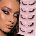 5 pairs of cat eye faux mink lashes showcasing a natural, wispy look.